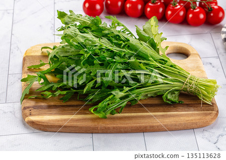 Raw green fresh arugula heap 135113628