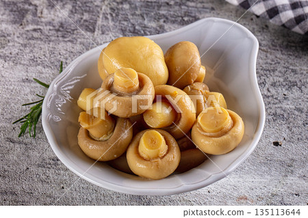 Marinated pickled champignon in the bowl Marinated pickled champignon in the bowl 135113644