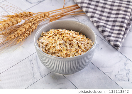 Dry oat flakes for porrige Dry oat flakes for porrige 135113842
