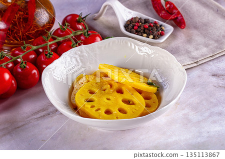 Marinated piclked lotus root slices 135113867