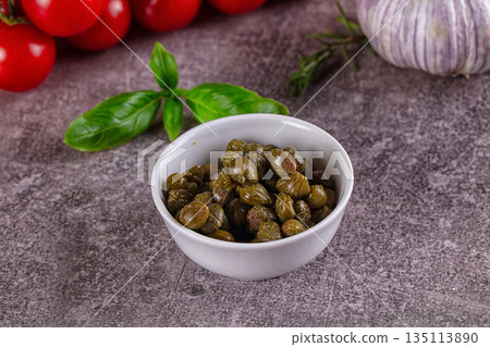 Canned marinated capers buds heap Canned marinated capers buds heap 135113890
