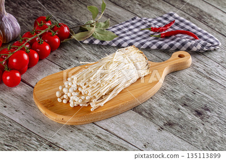 Raw organic fresh enoki mushrooms 135113899