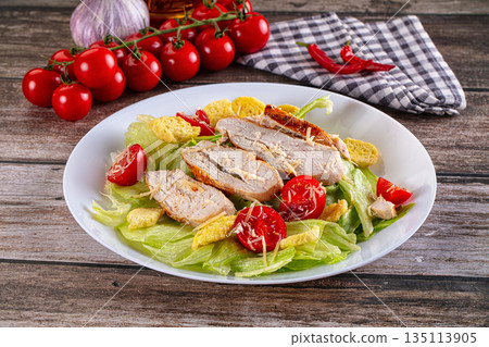 Salad caesar with chicken and croutons 135113905