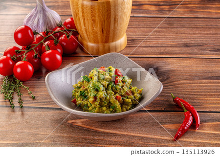Green avocado guacamole dip snack Green avocado guacamole dip snack 135113926