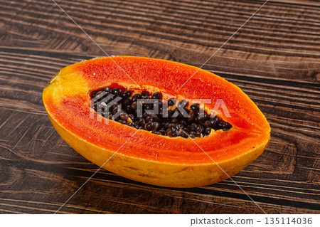 Sweet juicy tropical papaya cut half 135114036