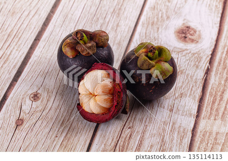 Ripe sweet juicy tropical mangosteen Ripe sweet juicy tropical mangosteen 135114113
