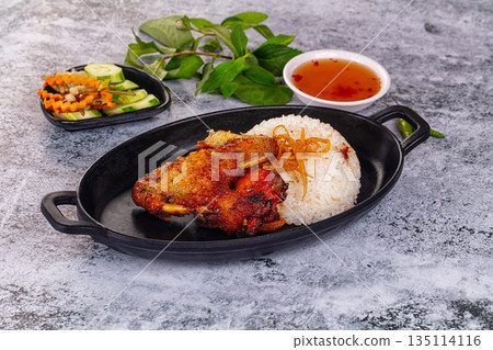 Spicy roasted chicken wing with rice 135114116