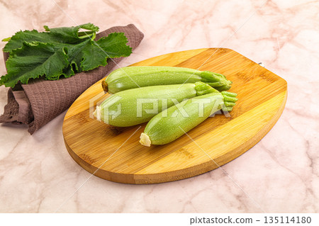 Green young small baby zucchini Green young small baby zucchini 135114180