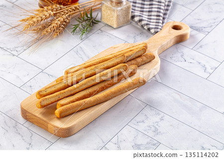 Baked Italian Grissini sticks heap 135114202