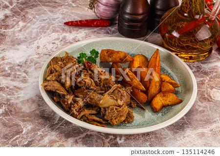 Baked shredded pork with potato 135114246
