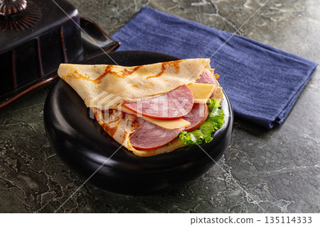 Ham and cheese pancakes for breakfast 135114333