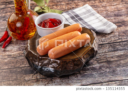 Boiled sausages with ketchup Boiled sausages with ketchup 135114355