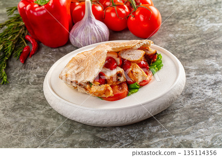 Pita with chicken and vegetables 135114356