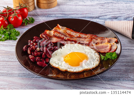 English breakfast with egg, bean and bacon English breakfast with egg, bean and bacon 135114474