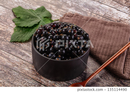 Sweet juicy Black currants berries Sweet juicy Black currants berries 135114490