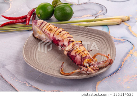 Tasty grilled wild squid with lime 135114525