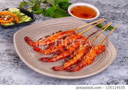 Grilled prawn skewer served sauce Grilled prawn skewer served sauce 135114535