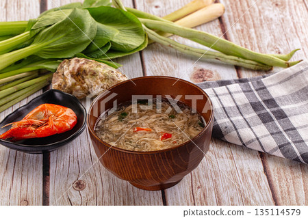 Asian soup with crab and prawn Asian soup with crab and prawn 135114579