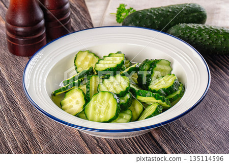 Fresh green ripe cucumber slices 135114596