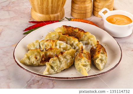 Japanese fried Gyoza stuffed dumplings 135114732