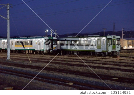 Kiha 110 series diesel railcar parked in the yard Kiha 110 series diesel railcar parked in the yard 135114921