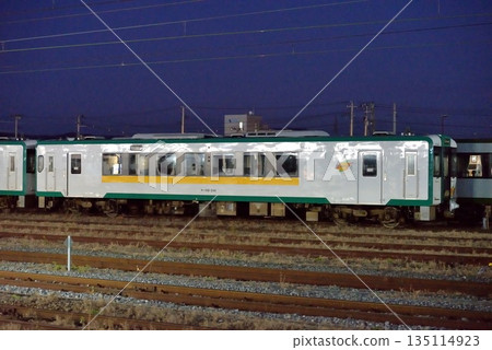 Kiha 110 series diesel railcar parked in the yard 135114923