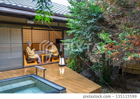 Senior couple relaxing at a traditional Japanese inn. Photo courtesy of Ito Ryokuyo. Senior couple relaxing at a traditional Japanese inn. Photo courtesy of Ito Ryokuyo. 135115599