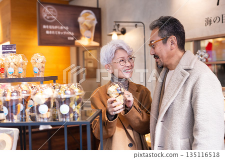 Senior couple shopping. Photo courtesy of Ito Marine Town Roadside Station. Senior couple shopping. Photo courtesy of Ito Marine Town Roadside Station. 135116518