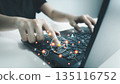 User working on a laptop with AI technology, finger pointing at artificial intelligence interface. Concept of technology, internet, innovation, smart working, digital transformation, automation, and f 135116752
