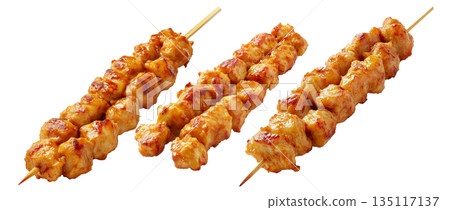 Grilled chicken Satay skewer with a golden brown glaze, isolated on white background, concept of tasty street food 135117137