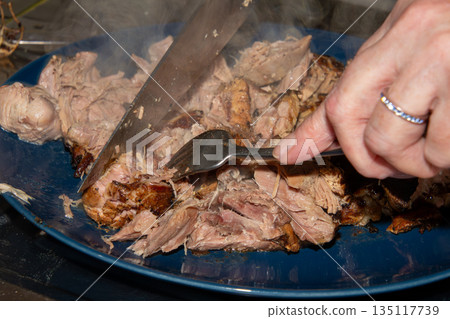 Preparing a stew with pork roll Preparing a stew with pork roll 135117739