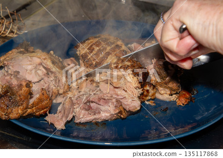 Preparing a stew with pork roll Preparing a stew with pork roll 135117868