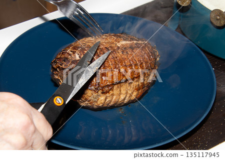 Preparing a stew with pork roll Preparing a stew with pork roll 135117945