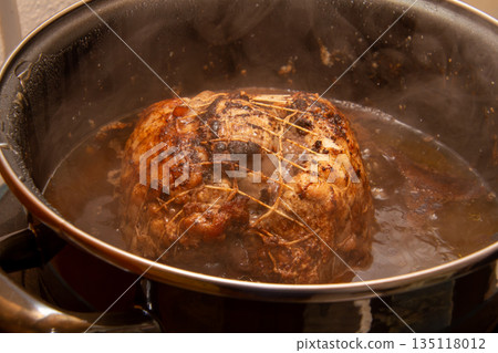 Preparing a stew with pork roll Preparing a stew with pork roll 135118012