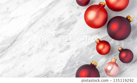 Red christmas baubles on marble table, holiday concept, copy space Red christmas baubles on marble table, holiday concept, copy space 135119292