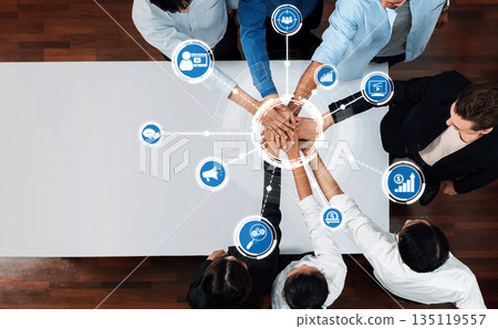 Collaborative Digital Marketing Strategies for Success: Hands Joining Around Data and Technology Symbols in a Modern Business Environment. Amity Collaborative Digital Marketing Strategies for Success: Hands Joining Around Data and Technology Symbols in a Modern Business Environment. Amity 135119557