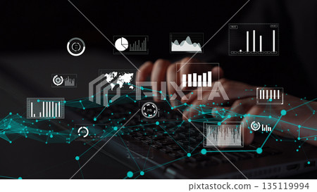 Hands typing on a laptop keyboard with digital graphs and data visualizations overlaying a dark background, representing technology and data analysis concepts xenic Hands typing on a laptop keyboard with digital graphs and data visualizations overlaying a dark background, representing technology and data analysis concepts xenic 135119994