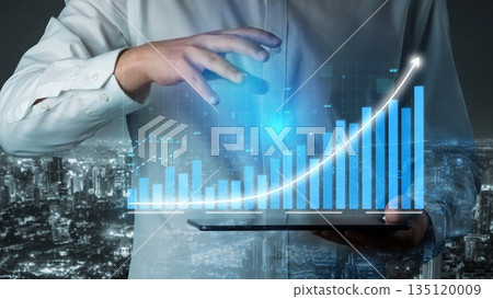 Business Professional Analyzing Digital Data with Graph and Chart for Financial Growth in Modern Urban Environment at Night Copula 135120009