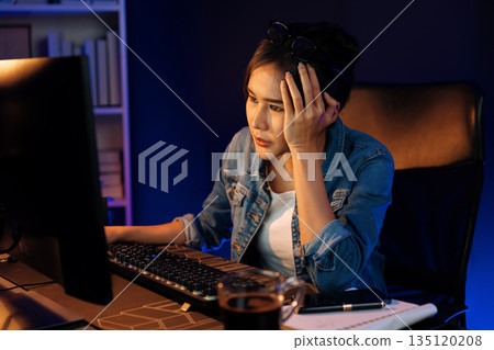 Stressful asian creative looking on pc to search project creator. Stratagem. 135120208