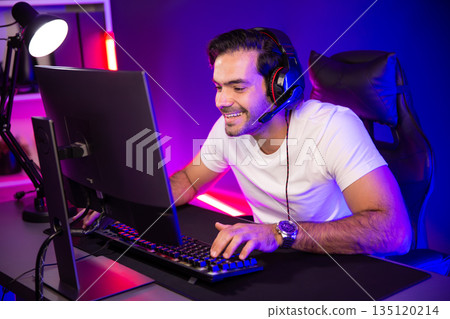 Smart streamer talking with team member players using headset and mic. Surmise. Smart streamer talking with team member players using headset and mic. Surmise. 135120214
