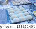 A large number of freshly pounded rice cakes rolled up and lined up 135121491