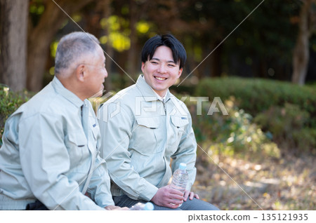 Young and senior people taking a break Young and senior people taking a break 135121935