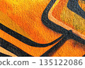 Abstract Orange and Black Graffiti Pattern with Textured Wall Surface for Retro 80s Street Art Style 135122086
