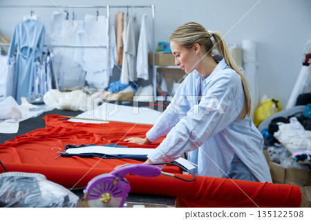 Artisan fabricator skilled in measuring and draping within boutique environment Artisan fabricator skilled in measuring and draping within boutique environment 135122508