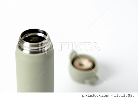 Water bottle, vacuum insulated mobile mug, white background 135123083