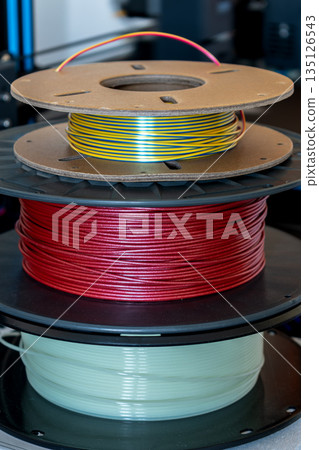 Spool of yellow pla filament for printing 3d printer Spool of yellow pla filament for printing 3d printer 135126543