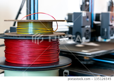 Spool of yellow pla filament for printing 3d printer 135126545