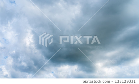 Many white clouds flowing in the summer blue sky Many white clouds flowing in the summer blue sky 135129331