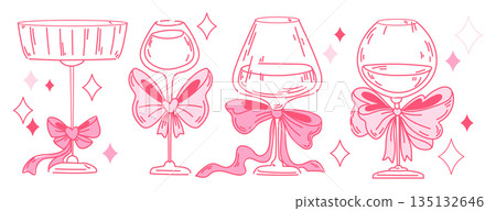 Cocktail glasses with pink bows and sparkles 135132646