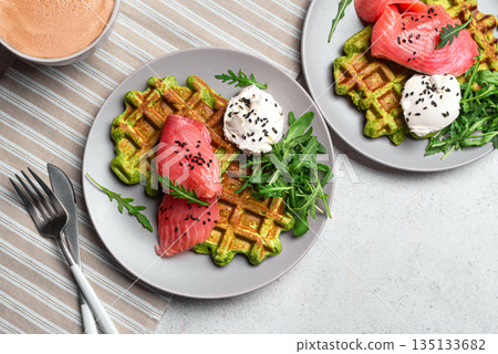 Healthy breakfast with green avocado based waffles and salmon Healthy breakfast with green avocado based waffles and salmon 135133682